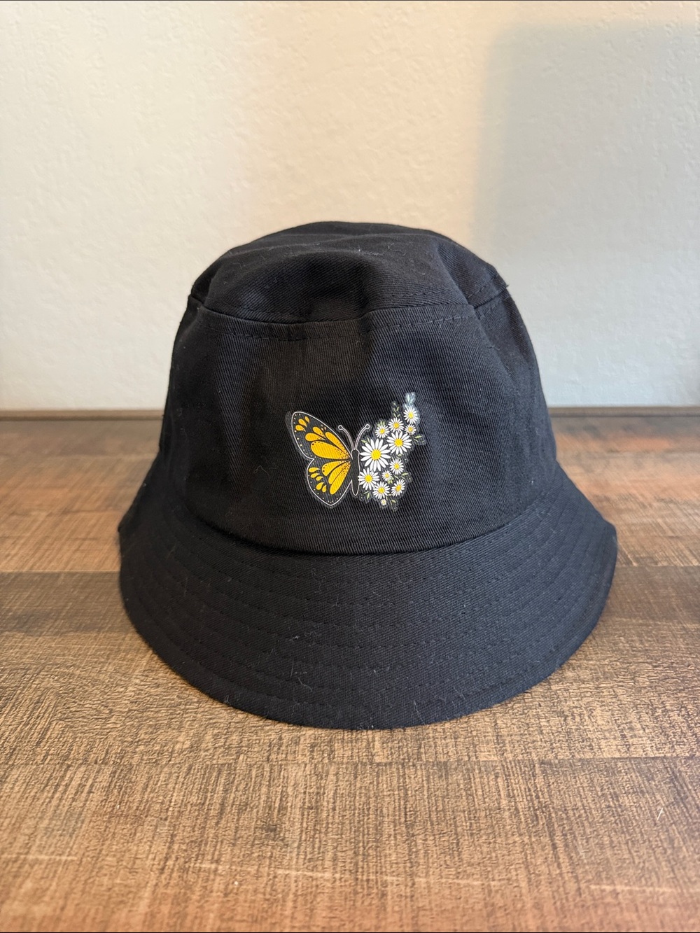 Urban Outfitters Black Bucket Hat with Yellow Butterfly and White Daisies - Picture 2 of 6